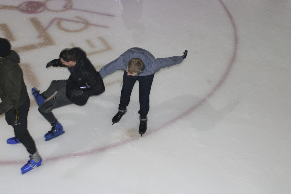 Two residents Ice Skating/Falling